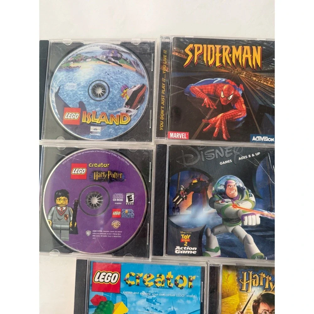 Vintage PC CD ROM Game Lot LEGO Harry Potter Spiderman Myst LOTR NASCAR Untested